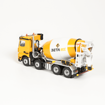 NZG Model of a yellow and white concrete mixer truck with 'BETA' branding on a white background