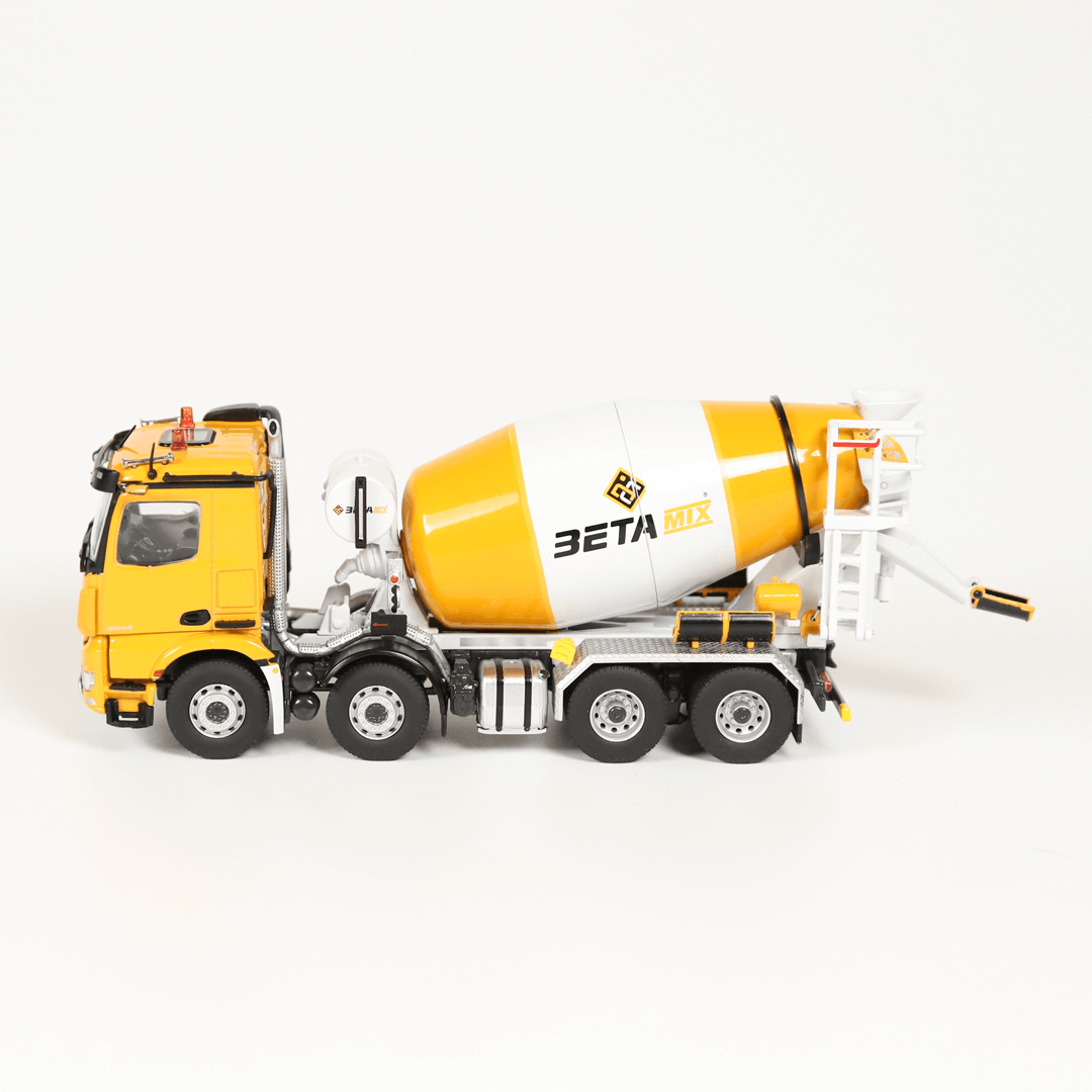 NZG Model of a yellow and white concrete mixer truck on a white background 