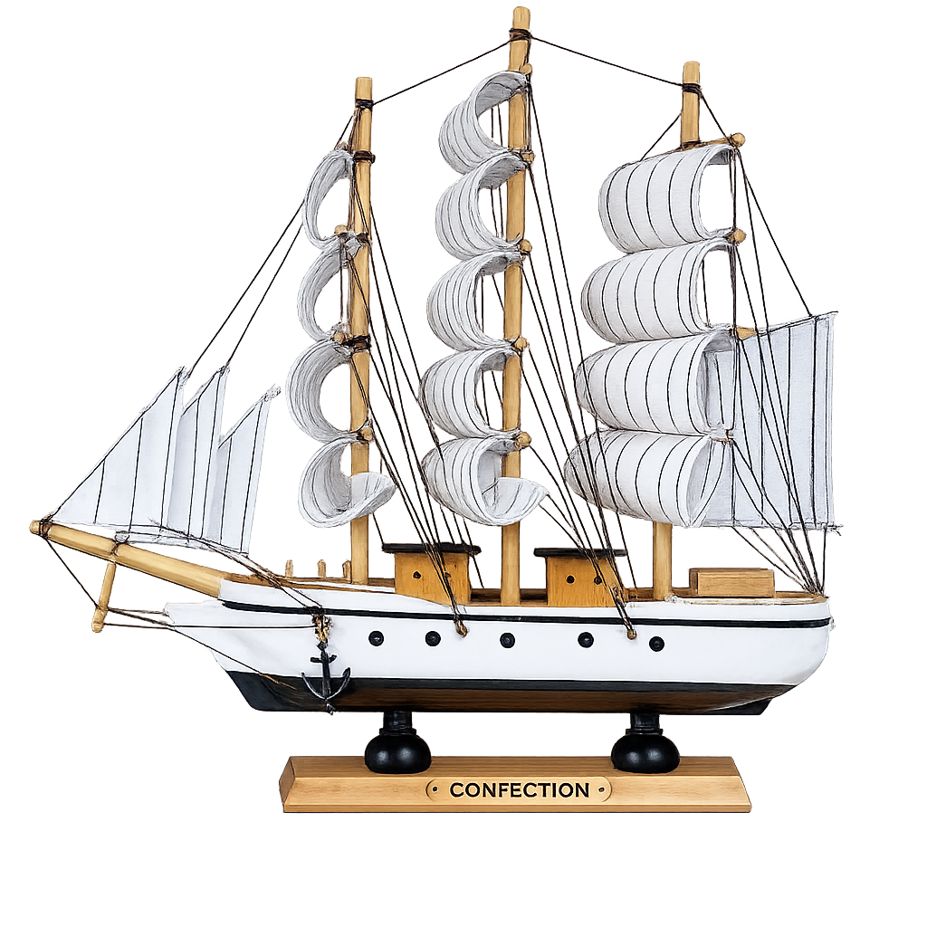 Model ship with multiple sails on a white background