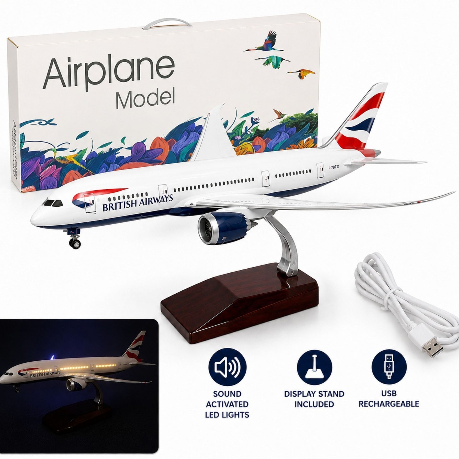 Model airplane with British Airways branding, packaging, and USB cable on a white background