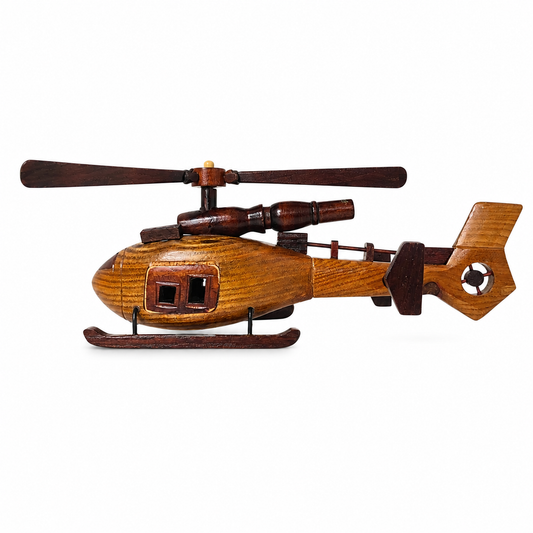 A wooden helicopter figurine or model made from natural wood with a warm brown finish and darker brown accents, shown against a plain white background.