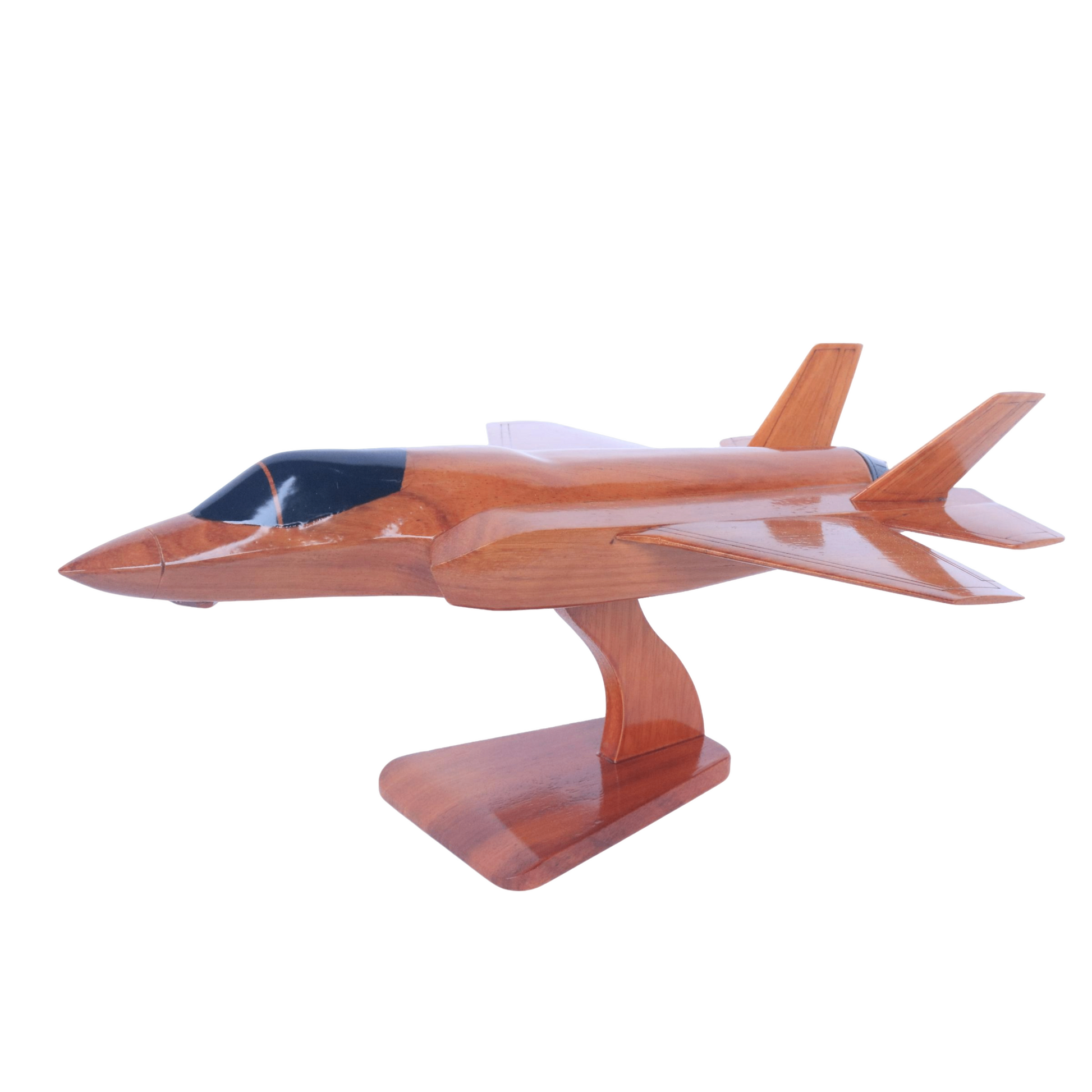 Wooden model of an airplane on a white background