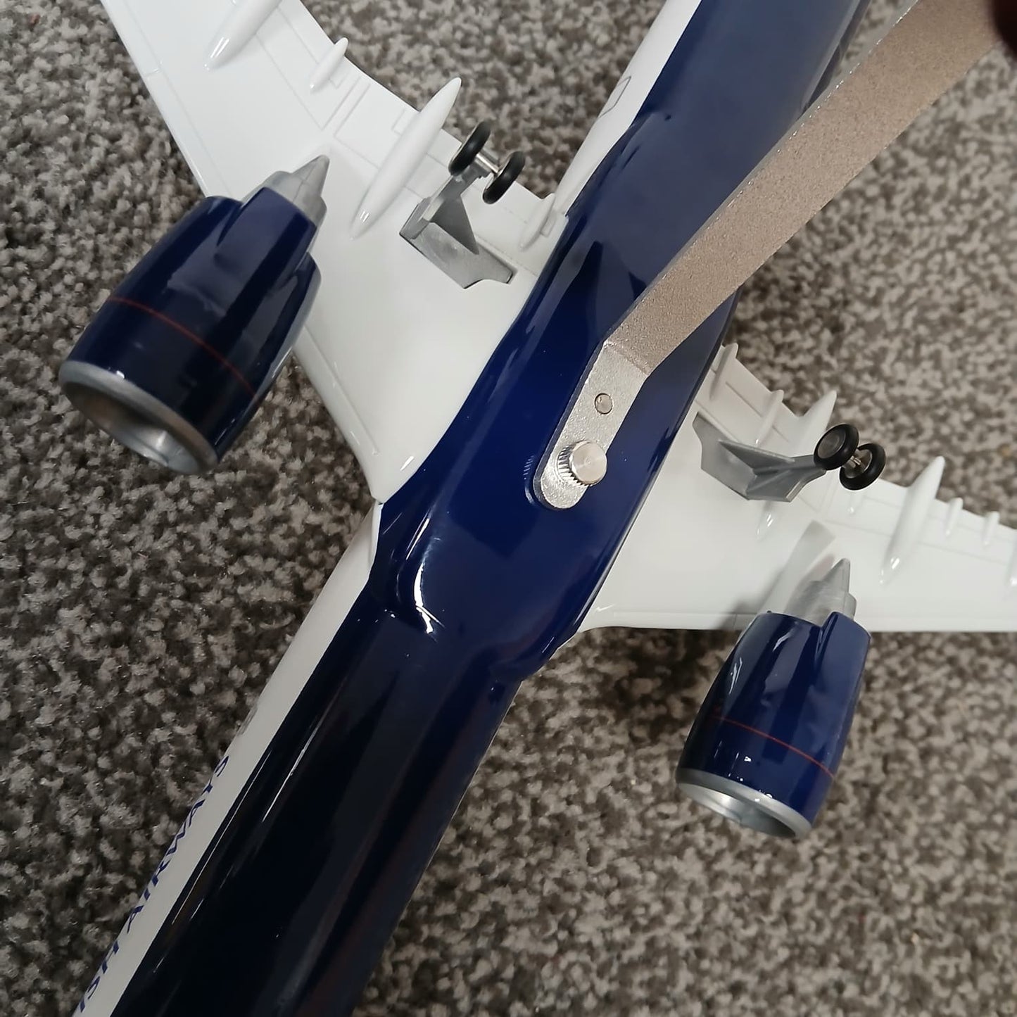 Airbus A321 Close-up of a model airplane on a textured surface