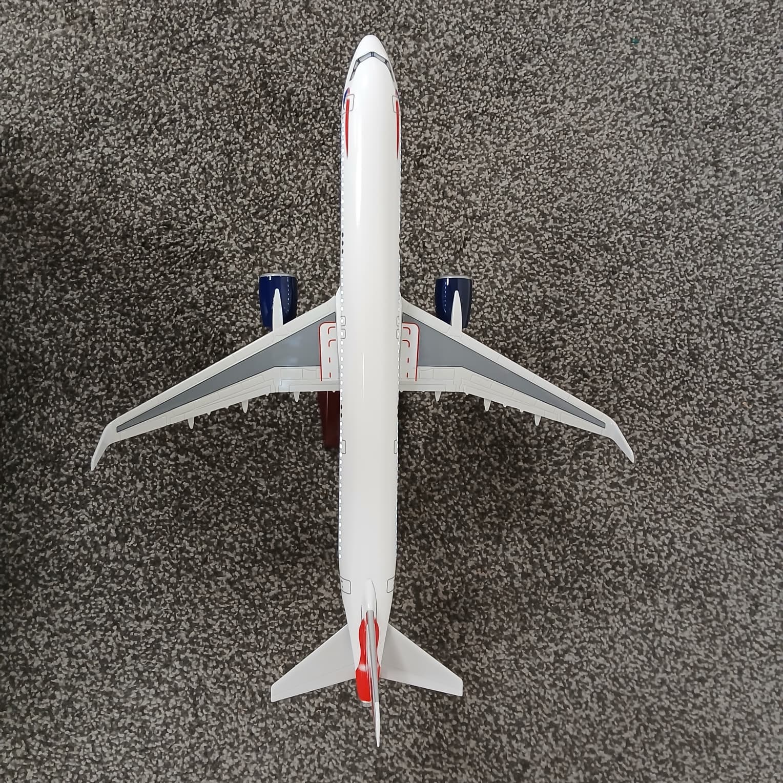Airbus A321 Model airplane on a textured gray surface
