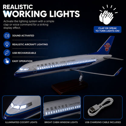 Model airplane with realistic working lights on a dark background