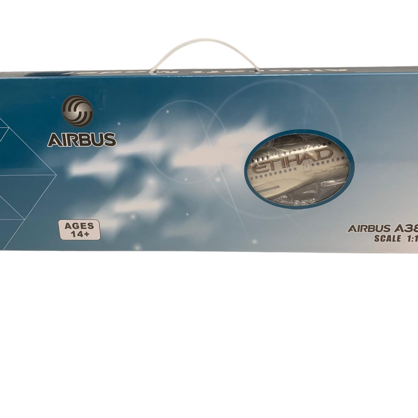 Box packaging of an Airbus model airplane with Etihad Airways branding on a blue sky background.