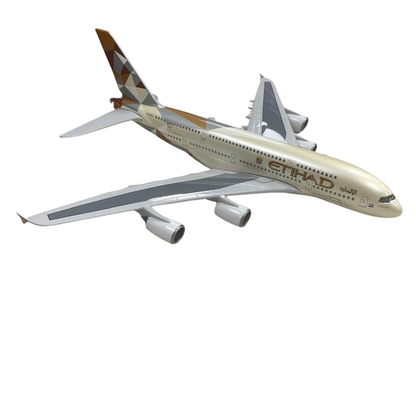 Model airplane with Etihad Airways branding on a white background
