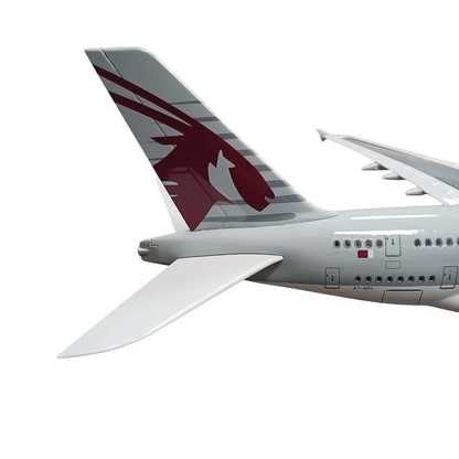 Airplane with Qatar Airways logo on a white background