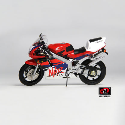 LCD Model motorcycle with red, white, and blue design on a gray background