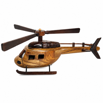 A wooden helicopter model or toy with a natural brown wood grain finish and dark brown accents, shown against a plain white background.